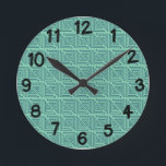Art Deco Teal Mazes Rund Klocka<br><div class="desc">Denna väggklocka har en Art Deco-design som är gjord av en höger vinkel med en maze inlagd i rialen på en fält av havets grönt.</div>