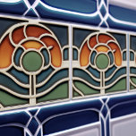 Art Nouveau Mackintosh Rose Ceramic Tile Kakelplatta<br><div class="desc">Evoke the spirit of the Art Nouveau movement with this exquisite ceramic tile, inspired by the iconic "Glasgow Rose" style of Charles Rennie Mackintosh. The design features a beautifully stylized rose, with petals in a warm gradient of terracotta and burnt orange. The intricate center reveals a muted sage green with...</div>