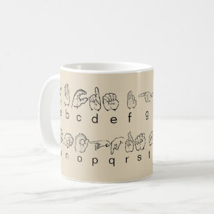 Asl-amerikanen undertecknar det språkFingerspell Kaffemugg