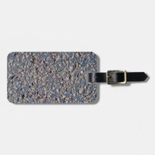 Asphalt och småstarna struktur bagagebricka