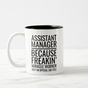 Assistant Manager på grund av Freakins Miracle Wo Två-Tonad Mugg