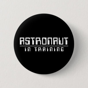 Astronaut i utbildningsknapp knapp