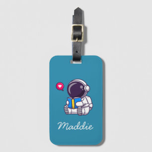 Astronaut läser söta barn i bok bagagebricka