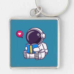 Astronaut läser söta barn i bok fyrkantig silverfärgad nyckelring