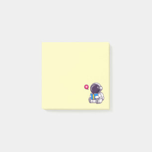 Astronaut läser söta barn i bok post-it block