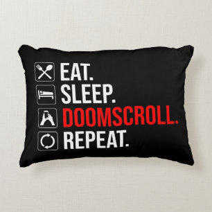 Ät. Sov. Doomscroll. Upprepa Prydnadskudde