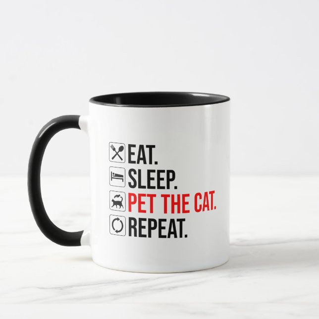 Ät. Sova. Kela med katten. Upprepa Mugg (Vänster)