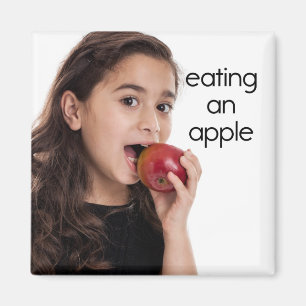 Äta ett magnet för kylskåp av äpple