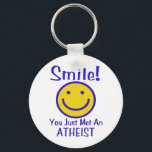 Ateist Nyckelring<br><div class="desc">Lägg ett mänskligt ansikte på Atheism med en skarp gult ansikte i blått med blått brev som säger: "Smile! Du träffade just en ATHEIST."</div>