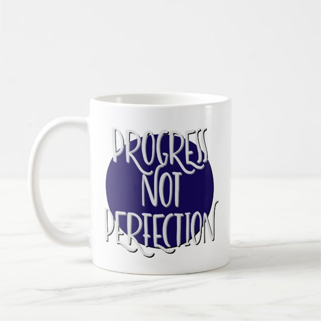 Återhämtningsmugg med slogan om framsteg, inte per kaffemugg (Vänster)