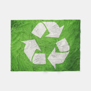 Återvinnans symbol på Glödbakgrunden. Grönt Fleecefilt