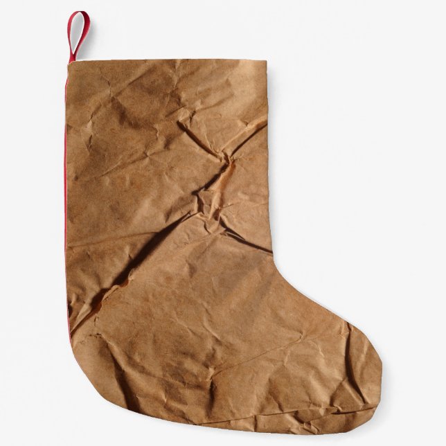 Återvunnen förpackning papper. Struktur. Liten Julstrumpa (Framsidan)