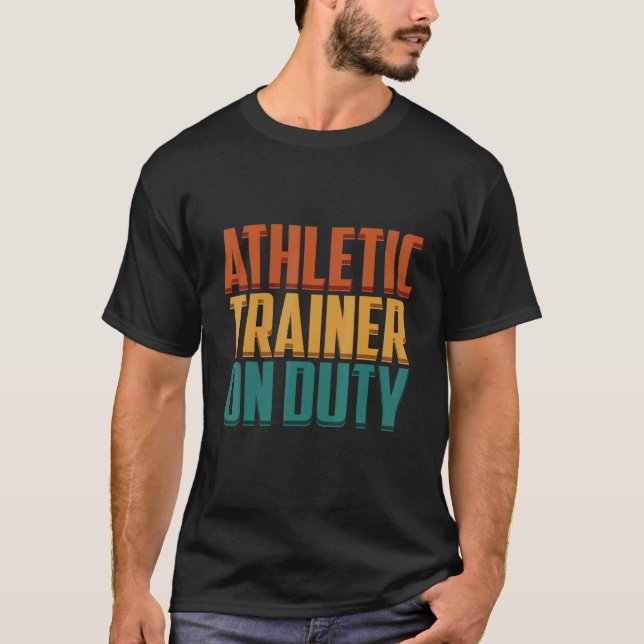 Athletic Trainer On Duty Fitness Coach Apparel T Shirt (Framsida)