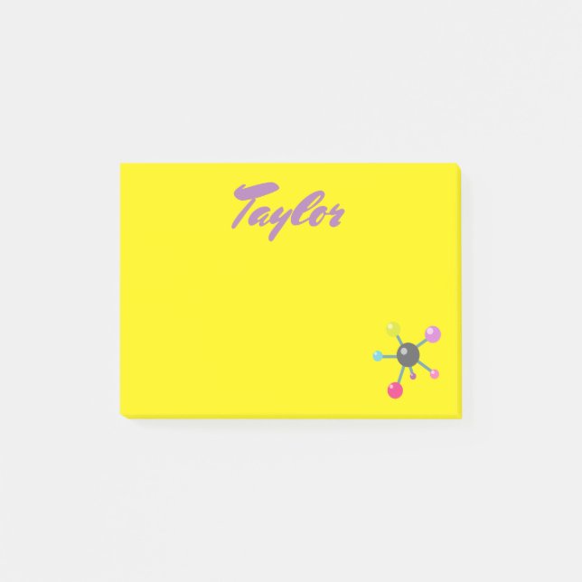 Atoms på gul bakgrund post-it block (Framsida)