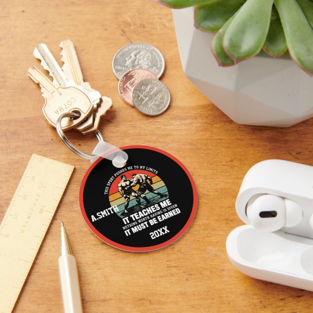 Att brottas med det måste vara jordat nyckelring (Skrivbord)