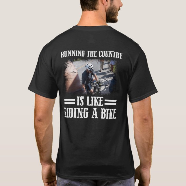 Att driva Land är som att rida en bike T-Shirt (Baksida)