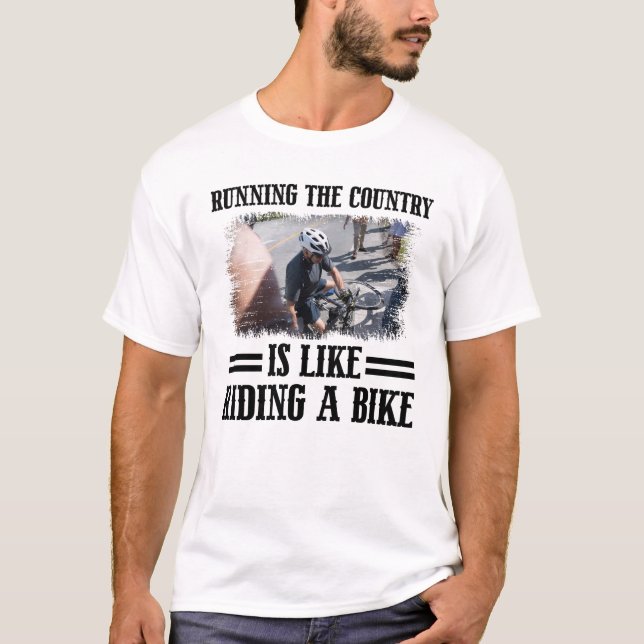 Att driva Land är som att rida en bike  T Shirt (Framsida)