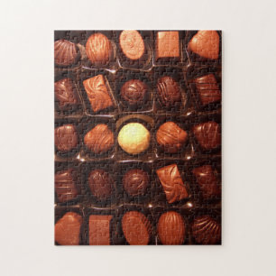 Att presentera för pussel boxas av chokladgodisen