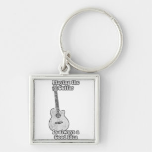 Att spela gitarr är alltid en bra idé. B & W Fyrkantig Silverfärgad Nyckelring