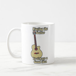 Att spela gitarr är alltid en bra idé. kaffemugg