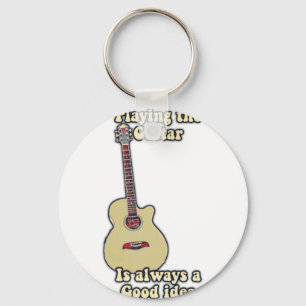Att spela gitarr är alltid en bra idé. nyckelring