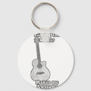 Att spela gitarr gör mig till fantastisk. nyckelring