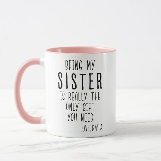 ATT VARA MIN SISTER ÄR DEN ENDA GIFT DU BEHÖVER. MUGG (Vänster)