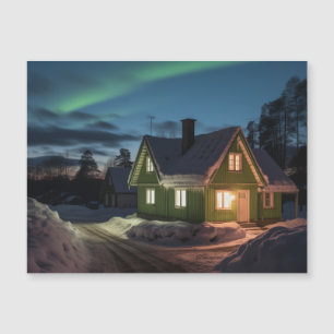 Aurora borealis över vinterkabinen