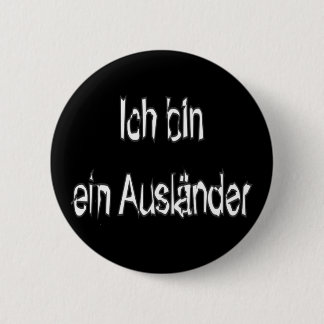 Auslander klämmer fast knapp