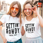 Austin Bachelorette Gettin Rowdy Bridesmaid T Shirt<br><div class="desc">Är du redo för party under en livstid? Oavsett om du gifta sig under de närmaste månaderna eller bara vill kasta en episk bachelorette-fest, så har vi har bara sak! Vår Austin Bachelorette Gettin Rowdy Anpassningsbar Bridesmaid T-shirt är perfekt för ditt flickgäng. Det är inte bara superskoj och fullt av...</div>