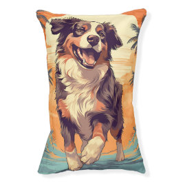 Australian shepherd vid en tropisk strand