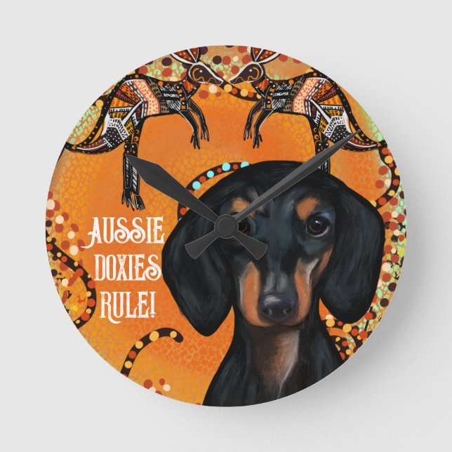 AUSTRALIEN KONST                RUND KLOCKA (Framsida)