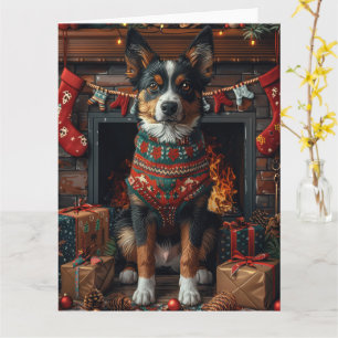 Australisk kelpie med julklappar öppen spis kort