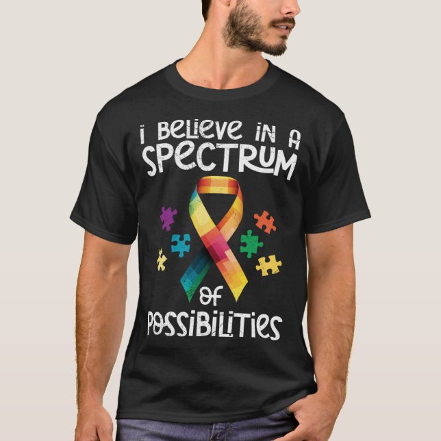 Autism I believe in a spectrum of possibilities Au T Shirt (Framsida)