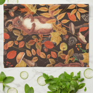 Autumnala ekorrar och flora på mörk bruna kökshandduk