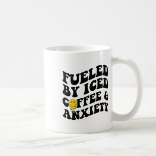 av iserad kaffe och giftig psykisk hälsa på baksid kaffemugg