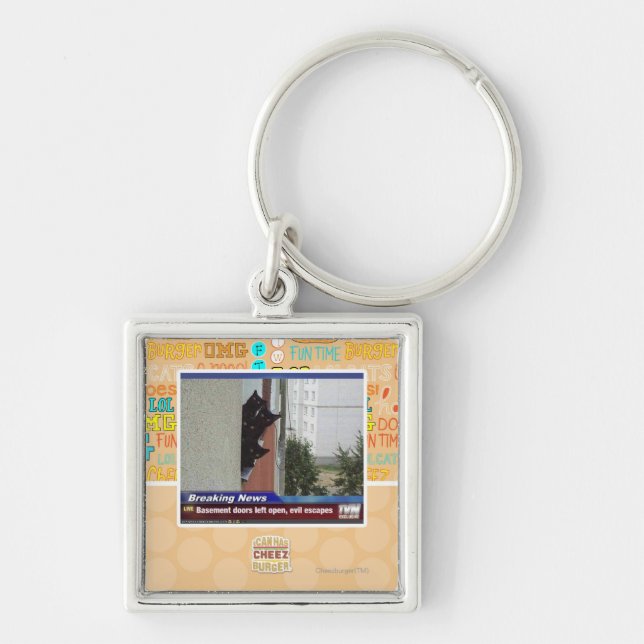 Avbrott av nyheterna 2 fyrkantig silverfärgad nyckelring (Framsidan)