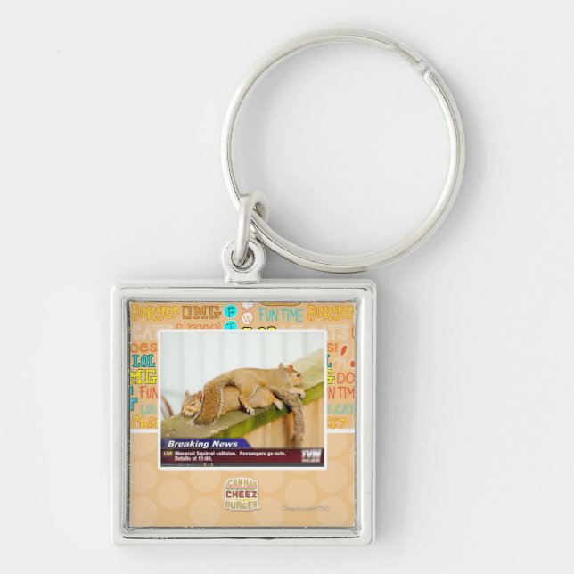 Avbrott av nyheterna fyrkantig silverfärgad nyckelring (Framsidan)