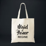 Avslappnad Maid of honor Monogram-favoriter i skri Tygkasse<br><div class="desc">Trend typography monogram tote bag. Med modern och snyggt innehåller anpassad design texten "Maid of honor" i avslappnadens skriptbokstäver och en redigerbar text fält för en namn i elegant sans serif i svart. Anpassa den här designen så att den passar stil genom att klicka på Anpassa för att gå till...</div>