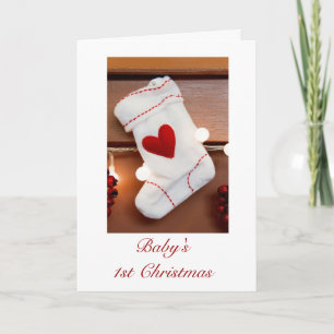 Baby 1st jul för första jul med strumpan helgkort