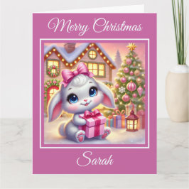 Baby Bunny vid en julstuga Kort