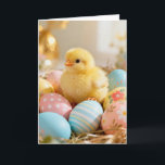 Baby Chick and Easter Eggs Kort<br><div class="desc">A fluffy yellow chick nestles among decorated eggs on this darling Easter card.  Very cute!</div>