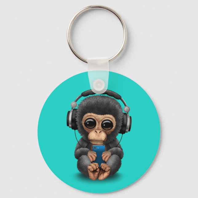 Baby Chimp med hörlurar och Mobila celler Nyckelring (Framsida)
