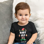 Baby elf-familjens matchande christmas-utrustning  t shirt<br><div class="desc">Gå in i helgdag-andan med den här roligten Baby elf-t-tröjan som ingår i en passande familjeförsörjarsamling som innehåller gåvor till någon familjemedlem. Perfekt för en återförening av julfamiljen, eller som en familj som matchar pajama, har den här t-shirten en snygg hatt och ben, med texten "Baby elf" i ett vitt,...</div>