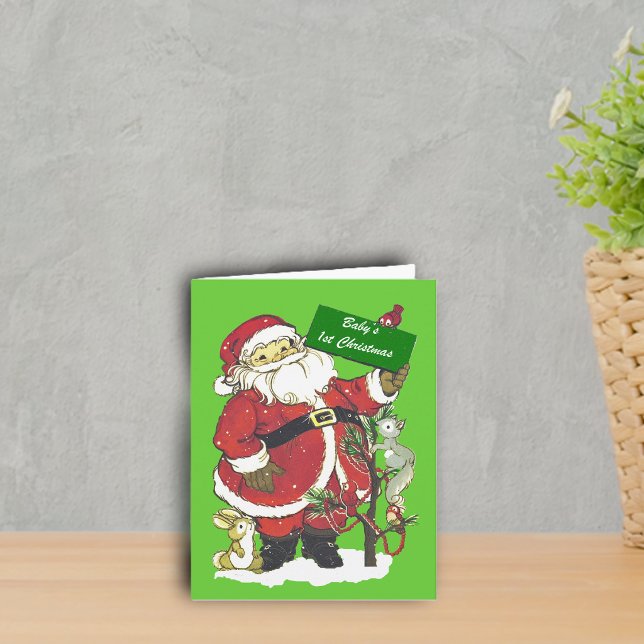 Baby första julSanta foto Helgkort (Happy Santa with forest animals decoration tree in snow on green Baby's 1st Christmas greeting card.)