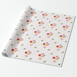 Baby julen röd tomteluva prickigt inslagspapper presentpapper