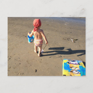 Baby på stranden vykort