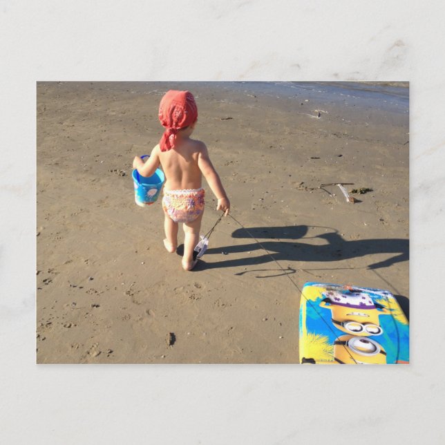 Baby på stranden vykort (Framsida)