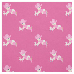 BabyCowgirl med rosa hatt- och Cowboykängatyg Tyg
