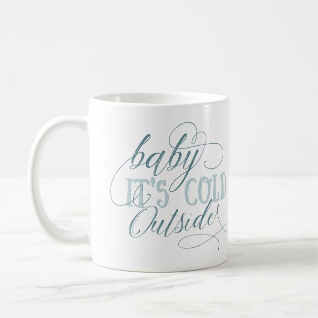 Babyen är det den kalla yttersidan skrivar kaffemugg (Vänster)
